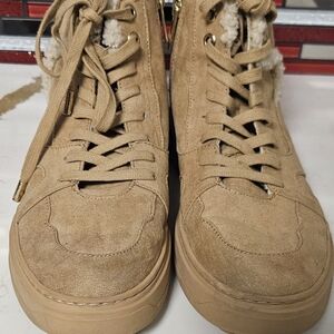 Jennifer Lopez Tan High-Top Sneakers